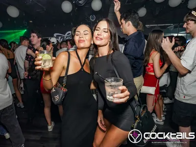 A professional photo of guests enjoying themselves at Cocktails Nightclub from our gallery.