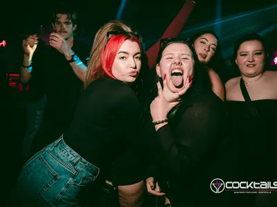 A professional photo of guests enjoying themselves at Cocktails Nightclub from our gallery.