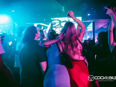 A professional photo of guests enjoying themselves at Cocktails Nightclub from our gallery.