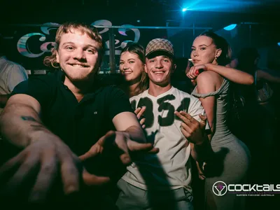 A professional photo of guests enjoying themselves at Cocktails Nightclub from our gallery.