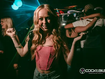 A professional photo of guests enjoying themselves at Cocktails Nightclub from our gallery.