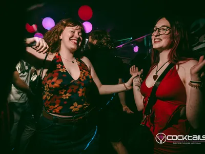 A professional photo of guests enjoying themselves at Cocktails Nightclub from our gallery.