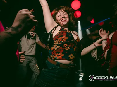 A professional photo of guests enjoying themselves at Cocktails Nightclub from our gallery.