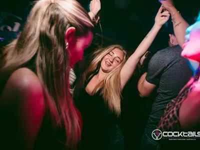 A professional photo of guests enjoying themselves at Cocktails Nightclub from our gallery.