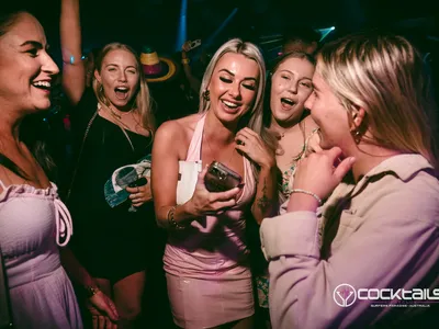 A professional photo of guests enjoying themselves at Cocktails Nightclub from our gallery.