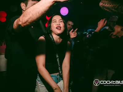 A professional photo of guests enjoying themselves at Cocktails Nightclub from our gallery.