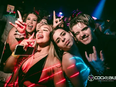 A professional photo of guests enjoying themselves at Cocktails Nightclub from our gallery.