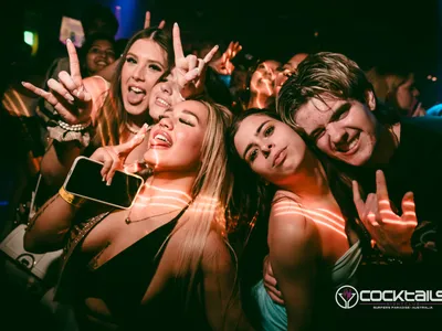 A professional photo of guests enjoying themselves at Cocktails Nightclub from our gallery.