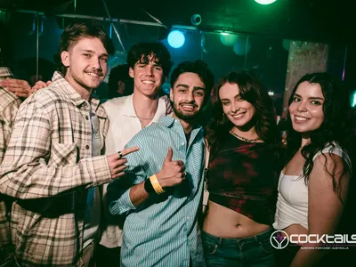 A professional photo of guests enjoying themselves at Cocktails Nightclub from our gallery.