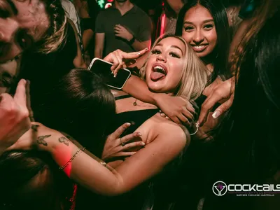 A professional photo of guests enjoying themselves at Cocktails Nightclub from our gallery.