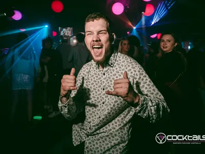 A professional photo of guests enjoying themselves at Cocktails Nightclub from our gallery.