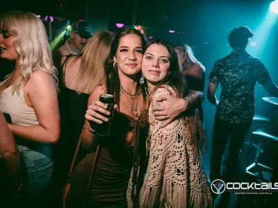 A professional photo of guests enjoying themselves at Cocktails Nightclub from our gallery.