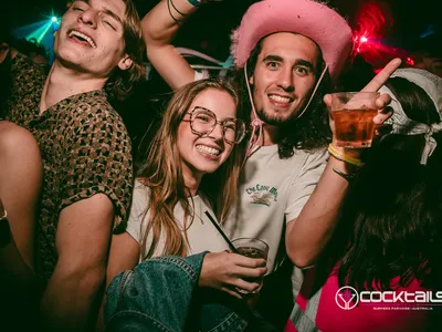 A professional photo of guests enjoying themselves at Cocktails Nightclub from our gallery.