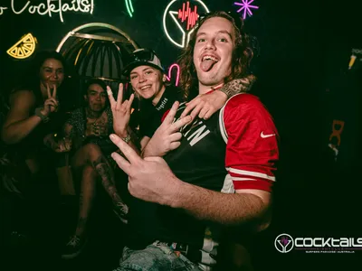 A professional photo of guests enjoying themselves at Cocktails Nightclub from our gallery.