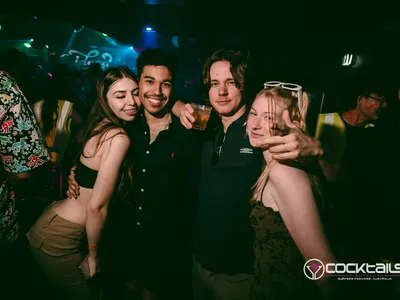 A professional photo of guests enjoying themselves at Cocktails Nightclub from our gallery.