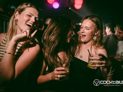 A professional photo of guests enjoying themselves at Cocktails Nightclub from our gallery.