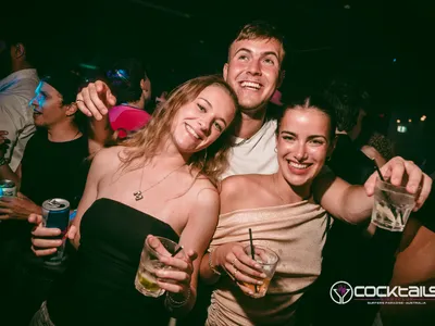 A professional photo of guests enjoying themselves at Cocktails Nightclub from our gallery.