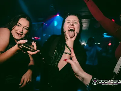 A professional photo of guests enjoying themselves at Cocktails Nightclub from our gallery.