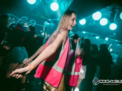 A professional photo of guests enjoying themselves at Cocktails Nightclub from our gallery.