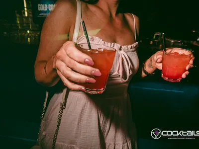 A professional photo of guests enjoying themselves at Cocktails Nightclub from our gallery.