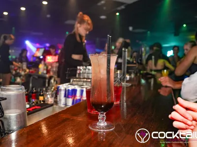 A professional photo of guests enjoying themselves at Cocktails Nightclub from our gallery.