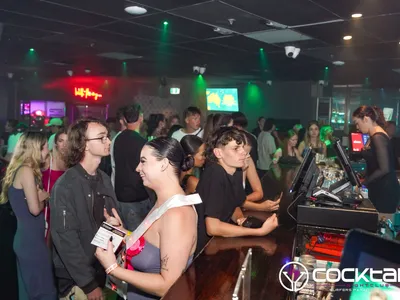 A professional photo of guests enjoying themselves at Cocktails Nightclub from our gallery.