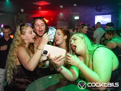 A professional photo of guests enjoying themselves at Cocktails Nightclub from our gallery.