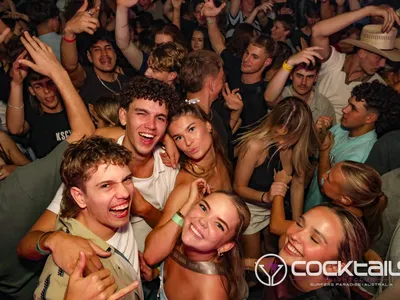 A professional photo of guests enjoying themselves at Cocktails Nightclub from our gallery.