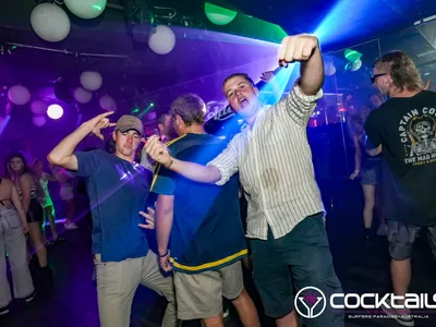 A professional photo of guests enjoying themselves at Cocktails Nightclub from our gallery.