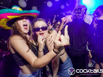 A professional photo of guests enjoying themselves at Cocktails Nightclub from our gallery.