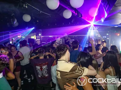 A professional photo of guests enjoying themselves at Cocktails Nightclub from our gallery.