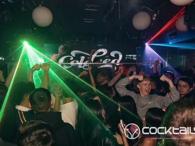 A professional photo of guests enjoying themselves at Cocktails Nightclub from our gallery.