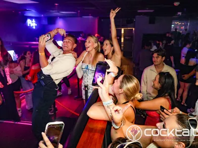 A professional photo of guests enjoying themselves at Cocktails Nightclub from our gallery.