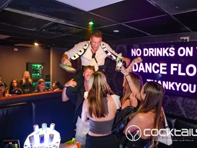 A professional photo of guests enjoying themselves at Cocktails Nightclub from our gallery.