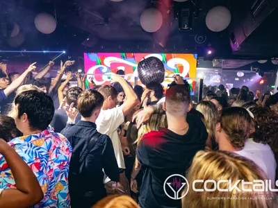 A professional photo of guests enjoying themselves at Cocktails Nightclub from our gallery.