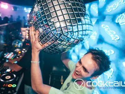 A professional photo of guests enjoying themselves at Cocktails Nightclub from our gallery.