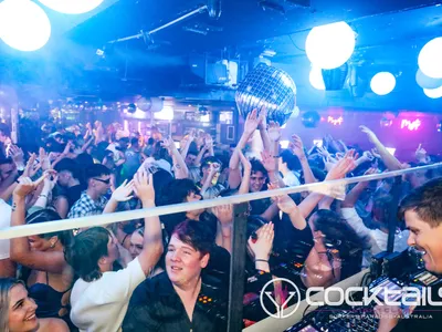 A professional photo of guests enjoying themselves at Cocktails Nightclub from our gallery.