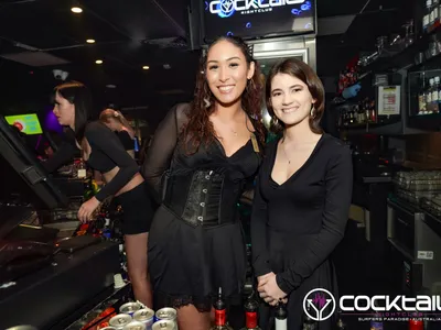 A professional photo of guests enjoying themselves at Cocktails Nightclub from our gallery.