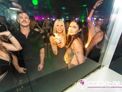 A professional photo of guests enjoying themselves at Cocktails Nightclub from our gallery.