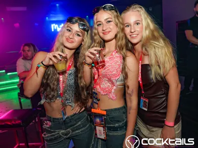 A professional photo of guests enjoying themselves at Cocktails Nightclub from our gallery.