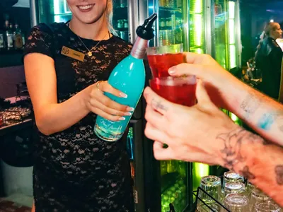 A professional photo of guests enjoying themselves at Cocktails Nightclub from our gallery.