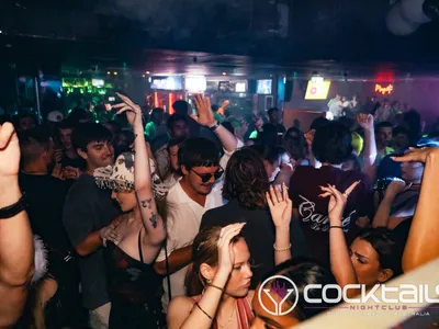 A professional photo of guests enjoying themselves at Cocktails Nightclub from our gallery.