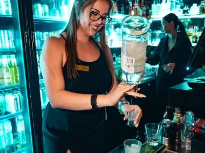 A professional photo of guests enjoying themselves at Cocktails Nightclub from our gallery.